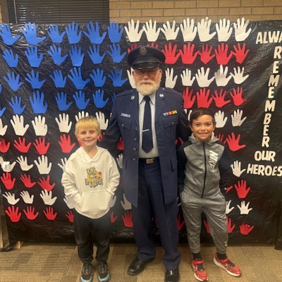 Dayton, Gary Peters, and Mason on Veterans Day.