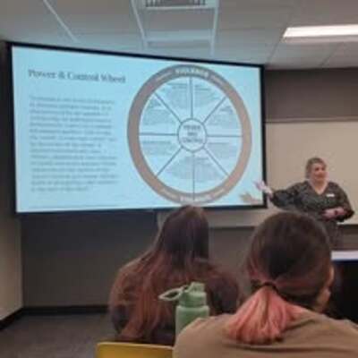 Kaiti Blackburn, Executive Director, presenting to an FHSU Criminal Justice Class