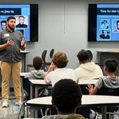 Garrett Kahrs, Programming Facilitator, Providing a Man2Man presentation